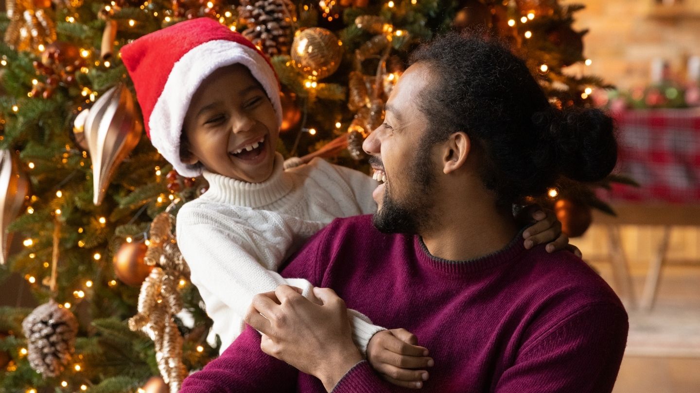 Man and child celebrating holidays