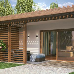 An Accessory Dwelling Unit photographed from outside with a patio