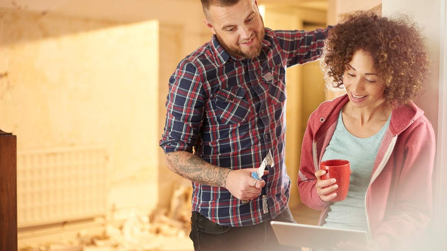 Couple reviewing remodeling plans