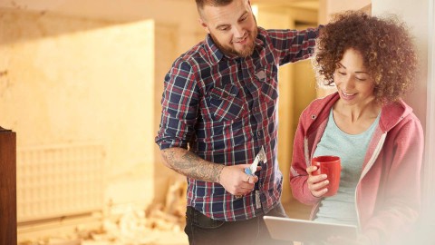 Couple reviewing remodeling plans