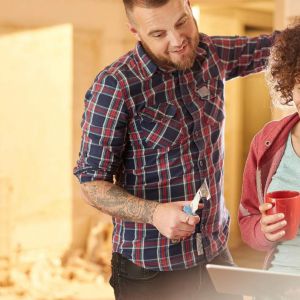 Couple reviewing remodeling plans